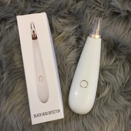 Blackhead Removal Device for Pore Cleansing and Skincare with packaging on display.